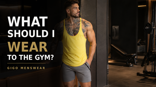 Gigo Menswear gym outfit cover with model wearing a yellow tank top and gray sport shorts for a men's gym style guide