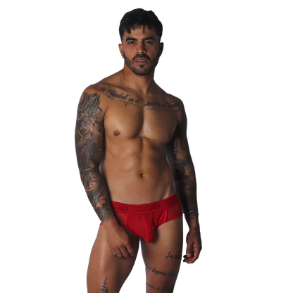 Evocative Red Jock Thong on model by Gigo Underwear