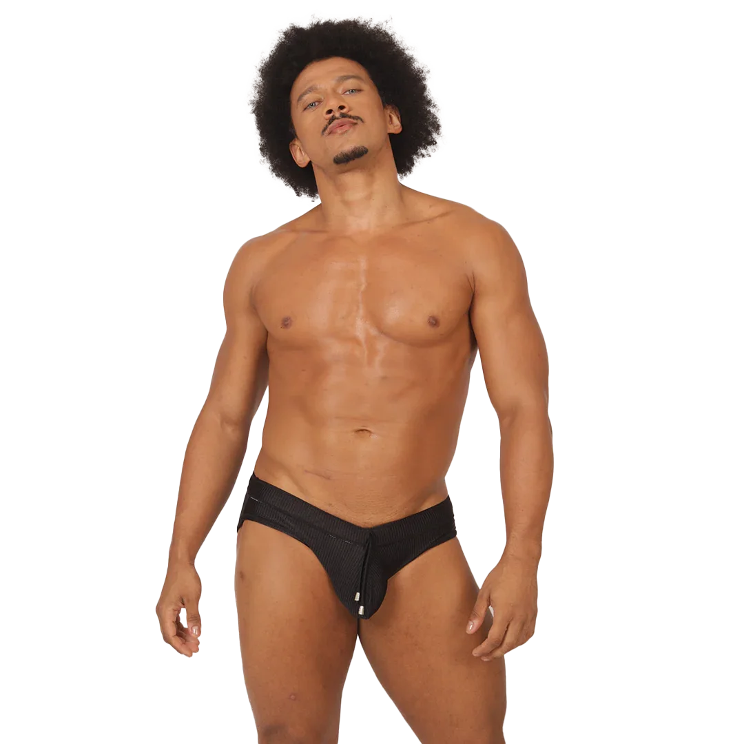 Glow Black Swimbrief on model by Gigo Underwear